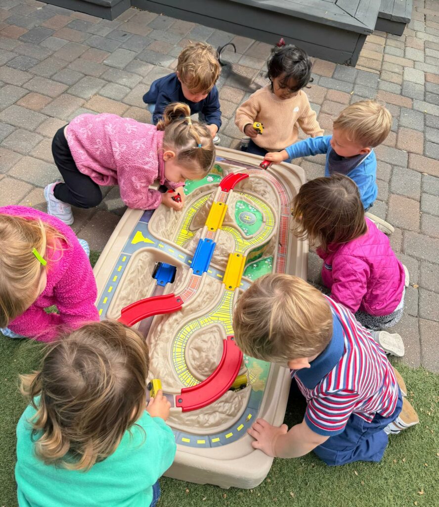 Happy toddlers and infants enjoying activities at Little Heaven Daycare in Corte Madera